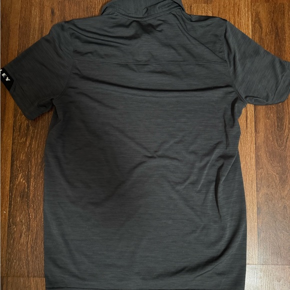 Oakley Black Polo Shirt Sleek Performance Design - Picture 3 of 3